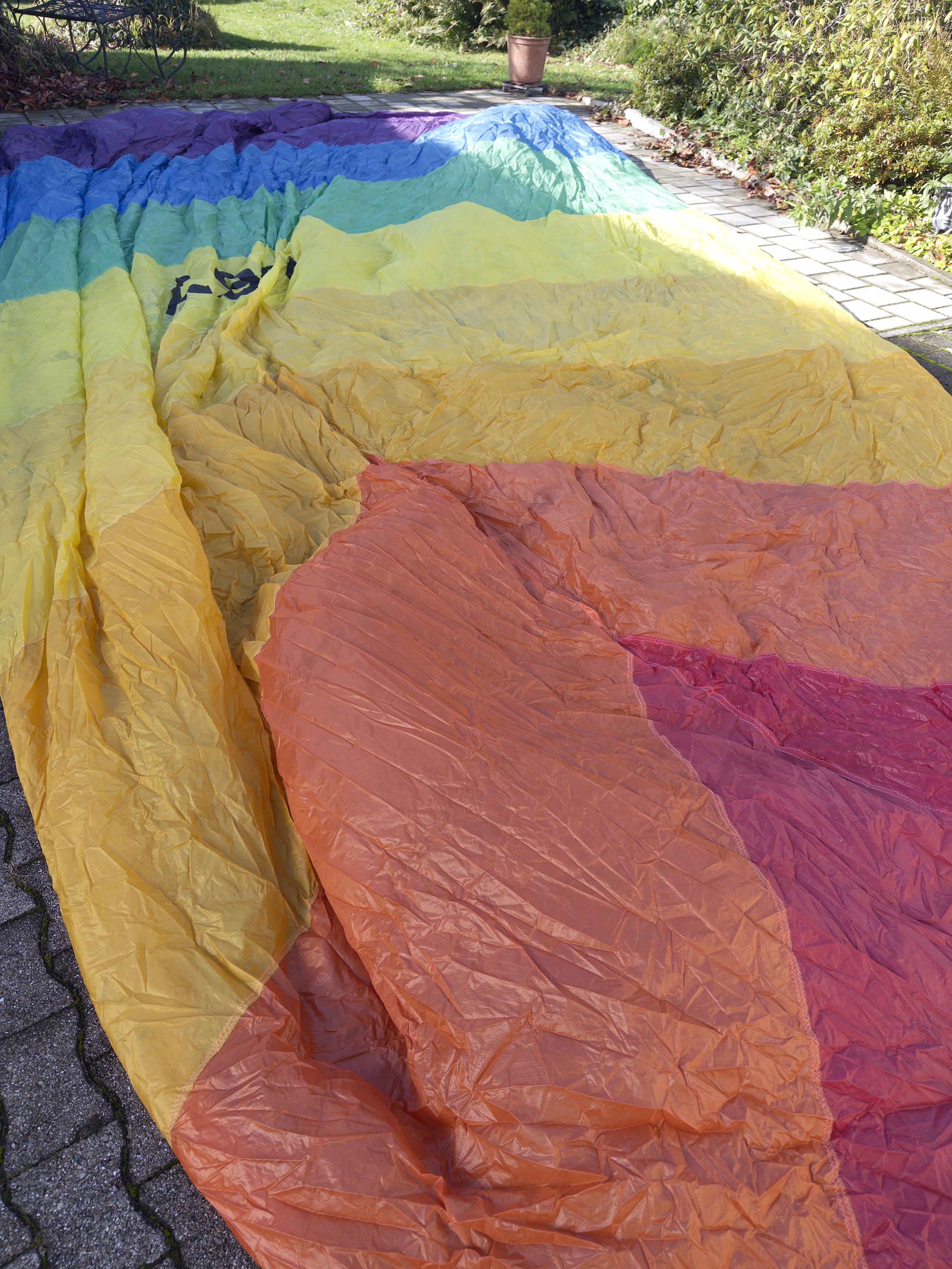 The spinnaker on the floor. It has from top to bottom the colors of the rainbow.